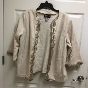 Bob Mackie jacket. Cream with a gold trim.